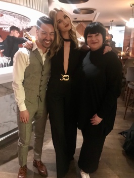 Nikki Taylor with Rosie Huntington-Whiteley and makeup artist Marc Reagan